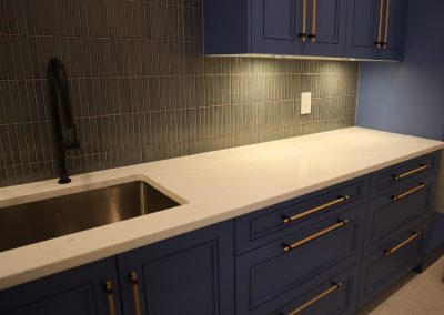 White kitchen, batroom, and table counter tops made locally in BC in Kelowna